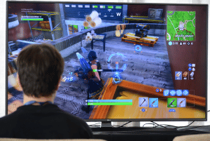 Young person playing Fortnite