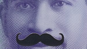 A zoomed in picture of the New Zealand $50 note with a moustache icon in place of Sir Apirana Ngata's real moustache