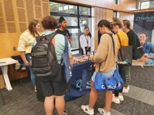 People visiting the Netsafe store at AUT